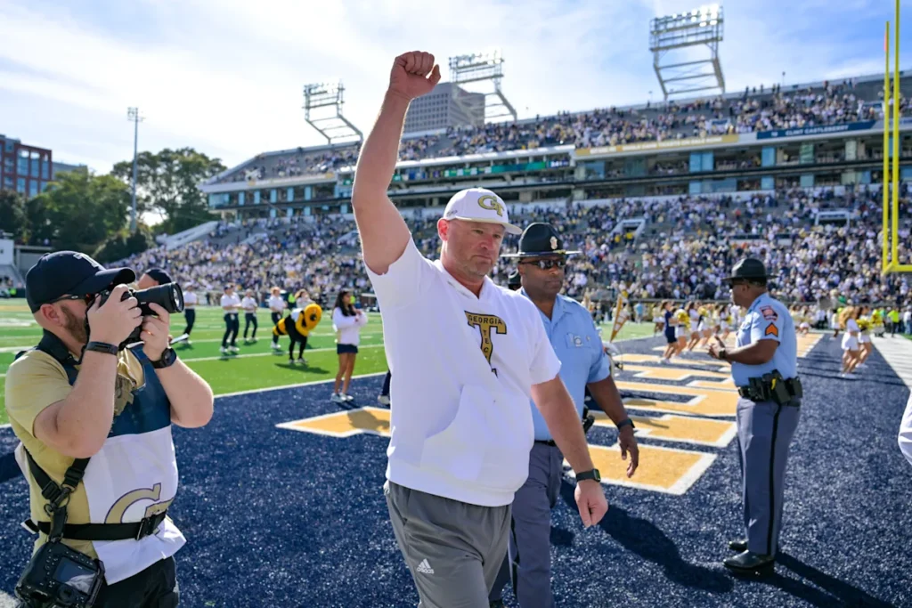 Georgia Tech coach Brent Key says being linked to other jobs is 'flattering' but 'slice me open and see what colors I bleed' Download app from appStore