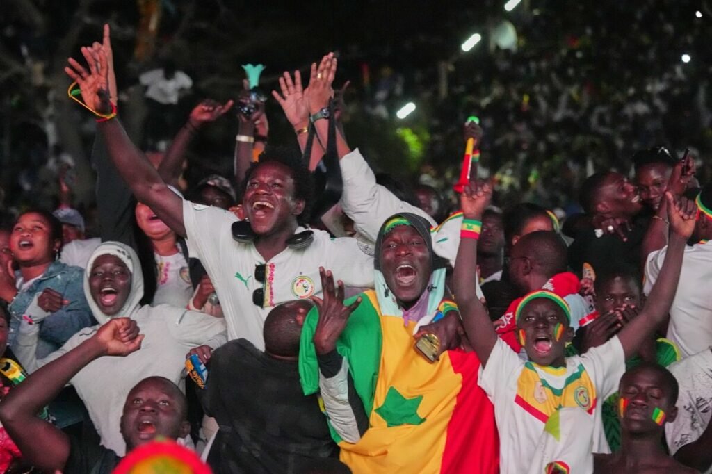 Senegal Celebrates Football Victory While Navigating Debt Talks