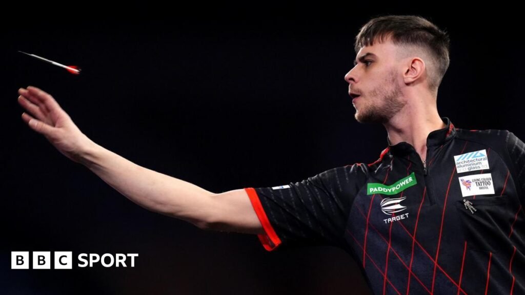 Dom Taylor throws a dart