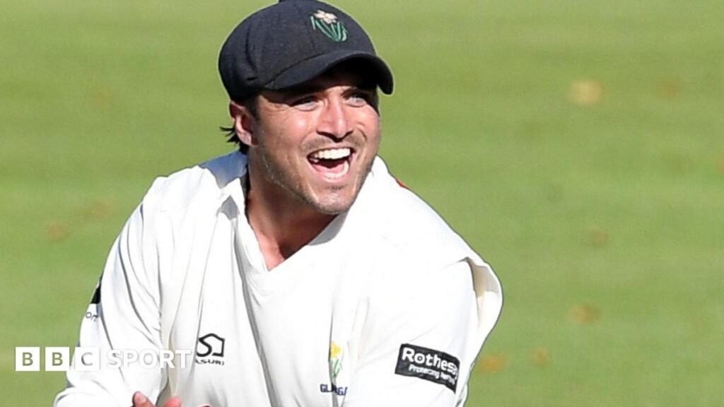 Kiran Carlson celebrates