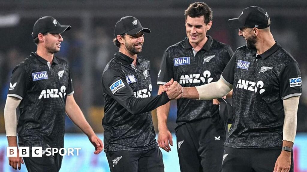 New Zealand players celebrate after winning the third one-day international against India to clinch the series