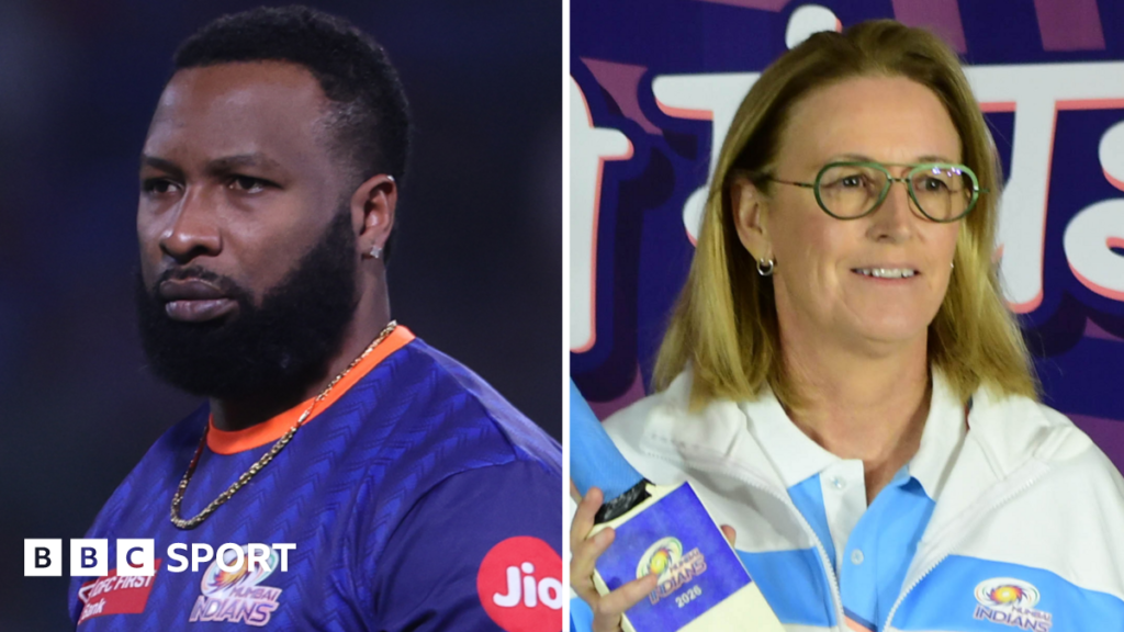 Kieron Pollard and Lisa Keightley wearing Mumbai Indians clothing