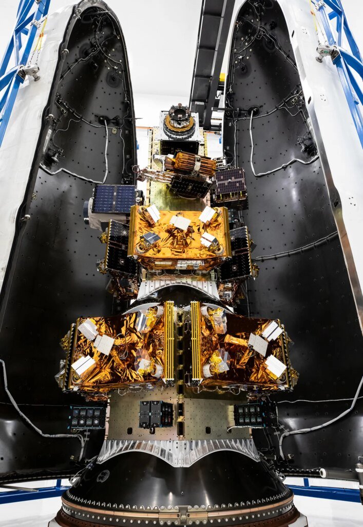 NASA’s Pandora small satellite, and NASA-sponsored Star-Planet Activity Research CubeSat (SPARCS), and Black Hole Coded Aperture Telescope (BlackCAT) CubeSat, inside a SpaceX Falcon 9 payload fairing