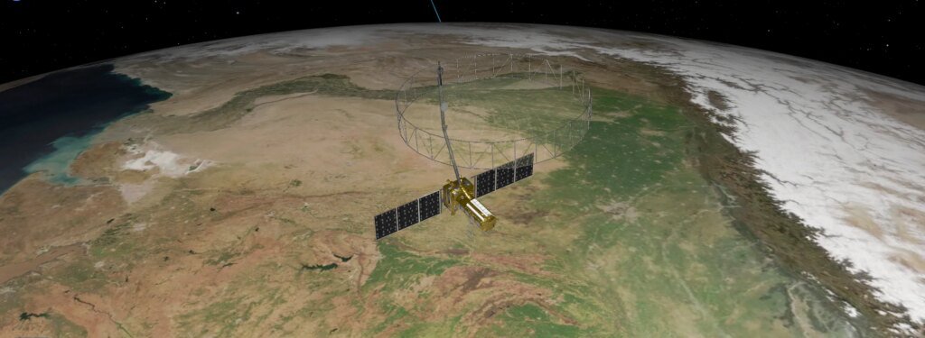 A 3D rendering of a satellite with solar panels and a wire mesh antenna orbiting Earth. The Earth is textured with continents and oceans. The satellite is in the foreground against a dark background with stars.